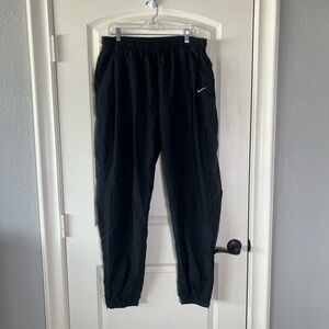 Vintage Nike Sweatpants Men's XXL
Nylon UNLINED Zip Pocket Drawstring Zip Ankle
